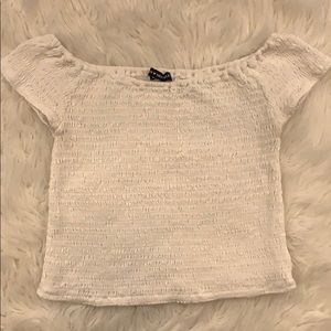 white off the shoulder smocked short sleeve shirt!